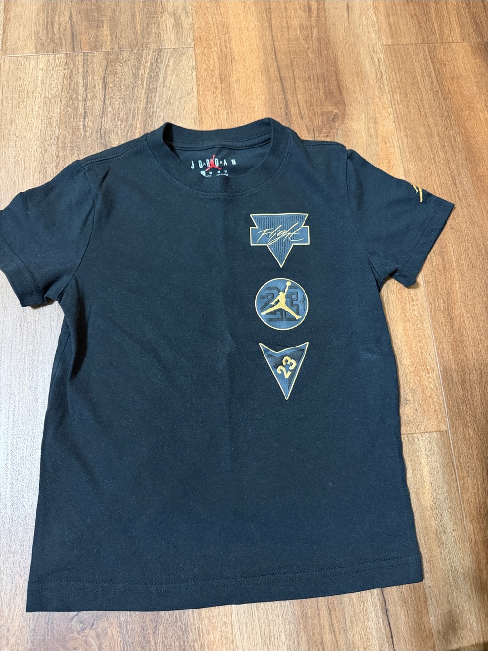 Jordan Black Tee with Gold Flight Icons